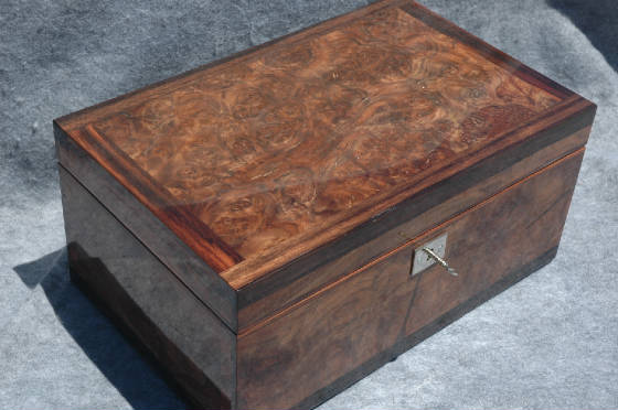 walnut burl humidor with ebony trim and lock